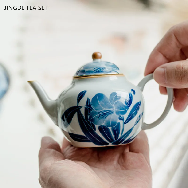 

90ml Hand-painted Lily Ceramic Tea Pot Home Filter Beauty Teapot Custom Chinese Ceramic Tea Set Ball Hole Filter Tea Infuser