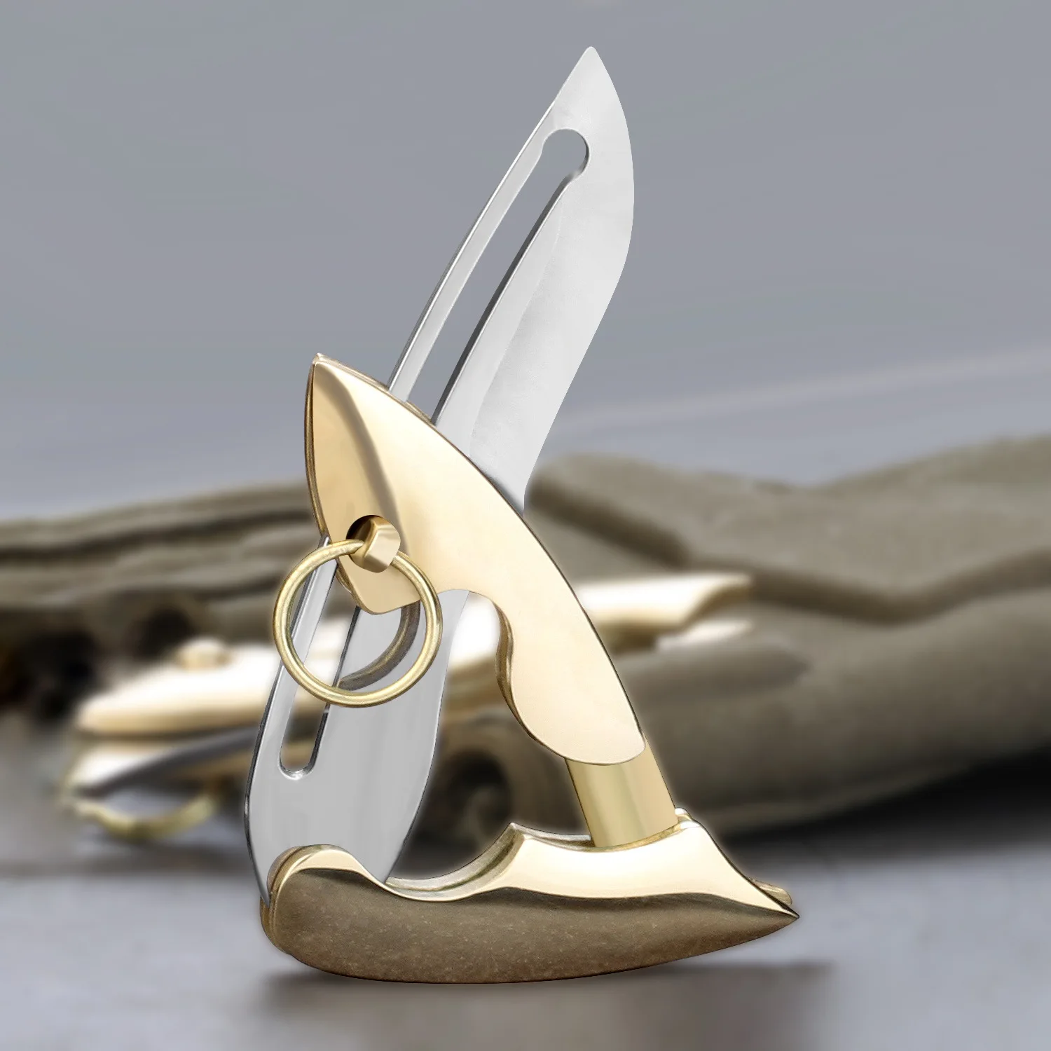 Small brass goldfish folding knife