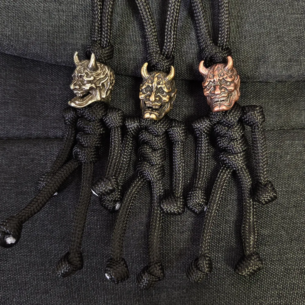 Paracord clasp Woven pendant Hannya mask Knife bead ornament Rope braided keychain Outdoor Backpack Lanyard はんにゃ