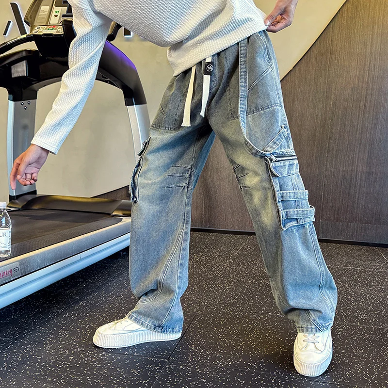 Celana Jeans Pria Berkualitas Tinggi GIOIOMen, Celana Denim Kasual Cargo Multi-Kantong dengan Tali Serut di Pinggang, Musim Gugur Musim Dingin 2025