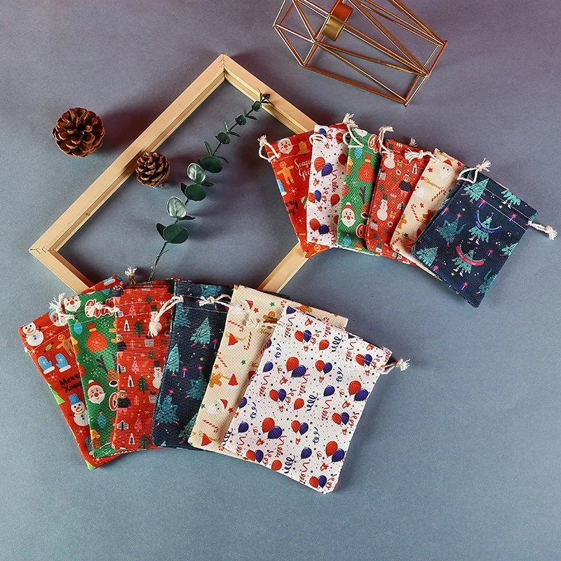 

50pcs/lot Printed Canvas Christmas Gift Bag Packaging Drawstring Thickened Happy Santa Claus Candy Apple Snack Festival Gift Bag
