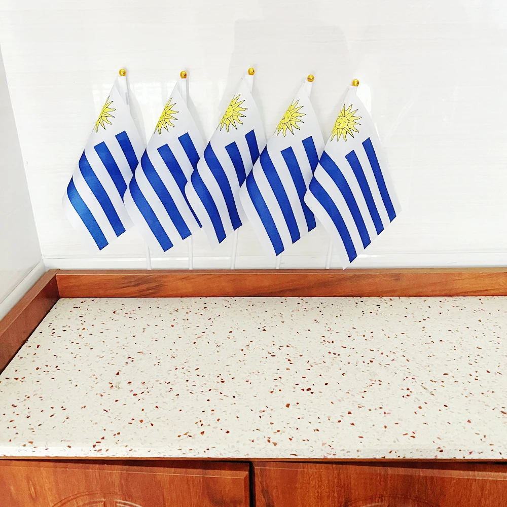 Uruguay Hand Flag 14 * 21cm Uruguay  Flag plastic flagpole, used for waving flags during holiday decoration activities