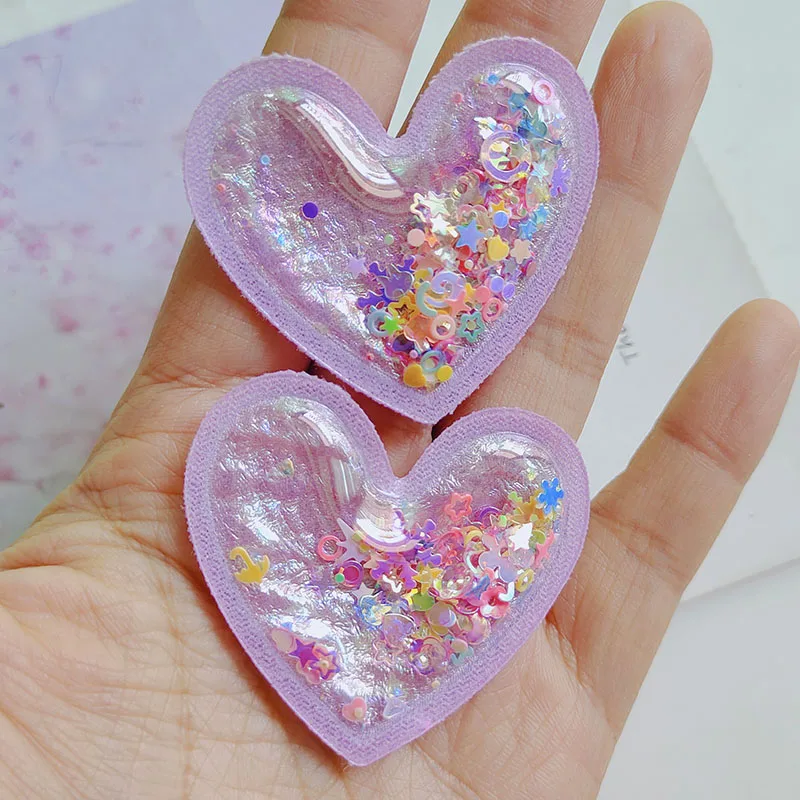 20pcs PVC Quicksand Cartoon Heart trasparente Bling Flowing patch Appliques per accessori per fascia per bambini fai da te