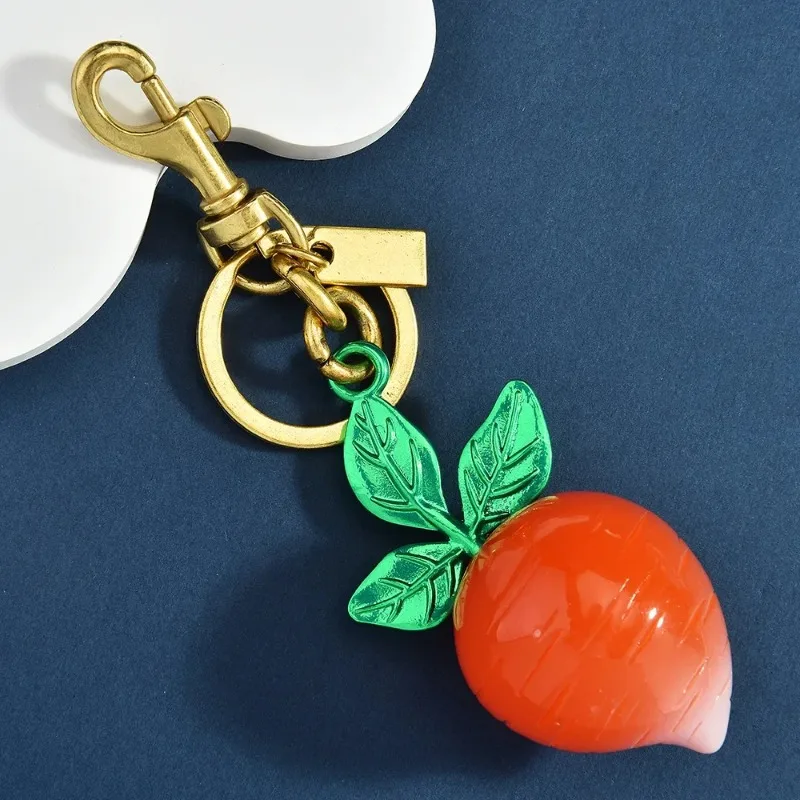 

Exquisite ladies' bags, accessories, pendants, radish bags, fruit key chains, and fashionable suitcases in 2025