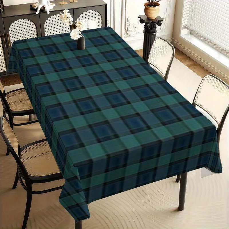 The elegant Scottish check tablecloth is made of polyester with a design featuring dark green and navy blue checks.