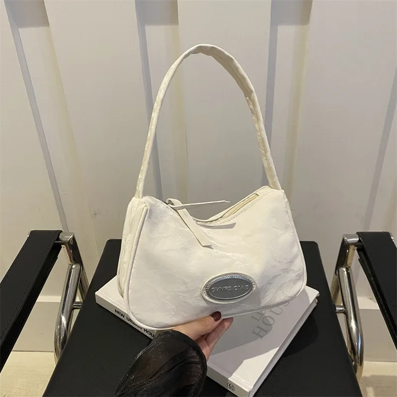 

Women's small fresh commuter versatile shoulder armpit bag high-end sense niche fashion exquisite handbag