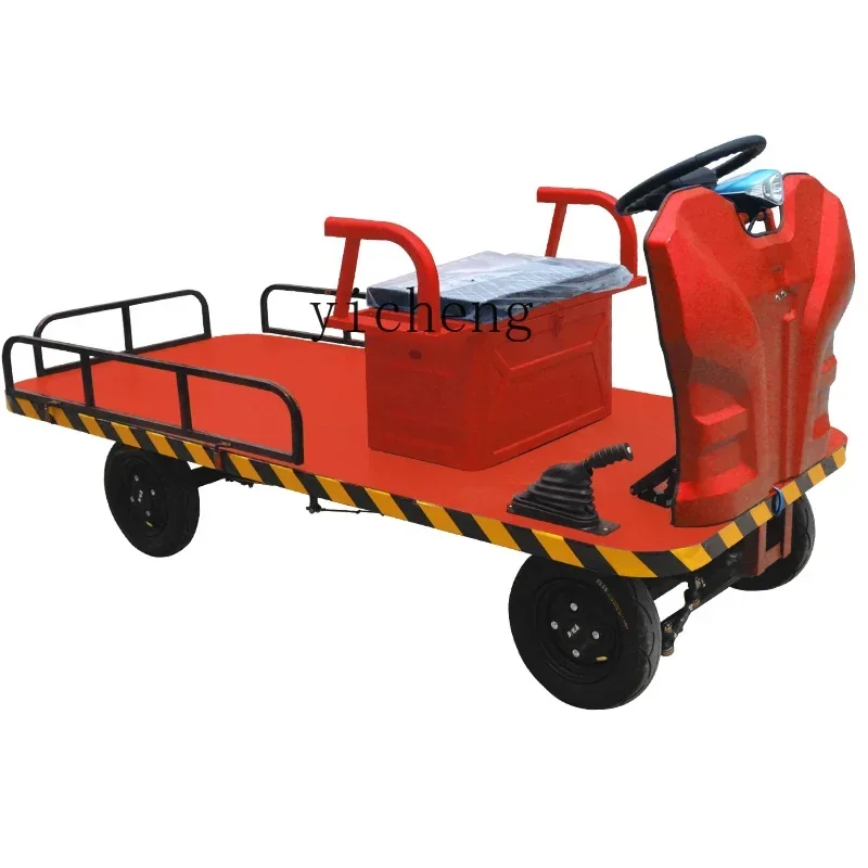 

электрический бортовой грузовик, тянущий грузовой нагрузку, логистический склад, инженерная обработка