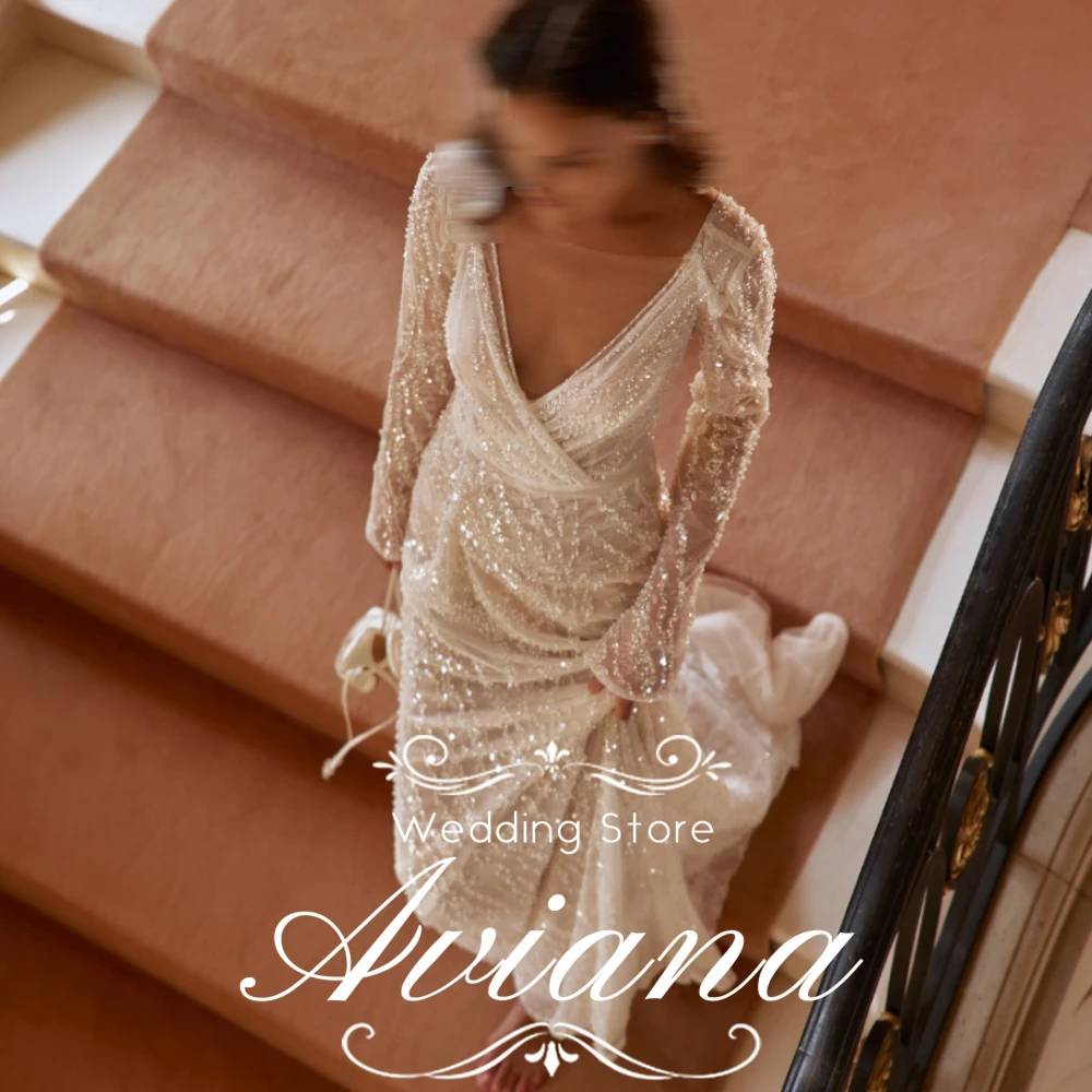 

Aviana Customized V Neck Beaded Bridal Gown Long Sleeves Deep V Exude Allure Mermaid Cut Hugs Curves Beads Add Sparkle Perfect