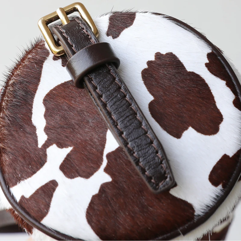 Bolsos cilíndricos vintage de pelo de caballo auténtico para mujer bolsos y carteras de diseño de lujo novedad 2026 con correa de piel de vaca y estampado de vaca bolso de hombro pequeño para axila alta calidad