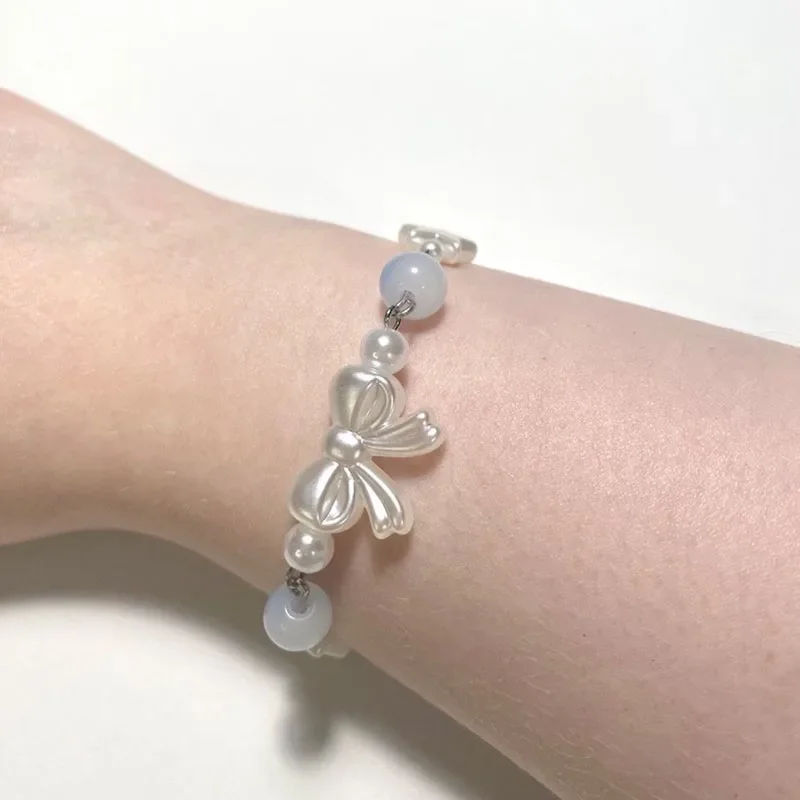 Handmade Coquette bracelet/Friendship jewelry/Beaded bow imitation pearl jewelry/Minimalist jewellery/Star charm beads/Gift idea