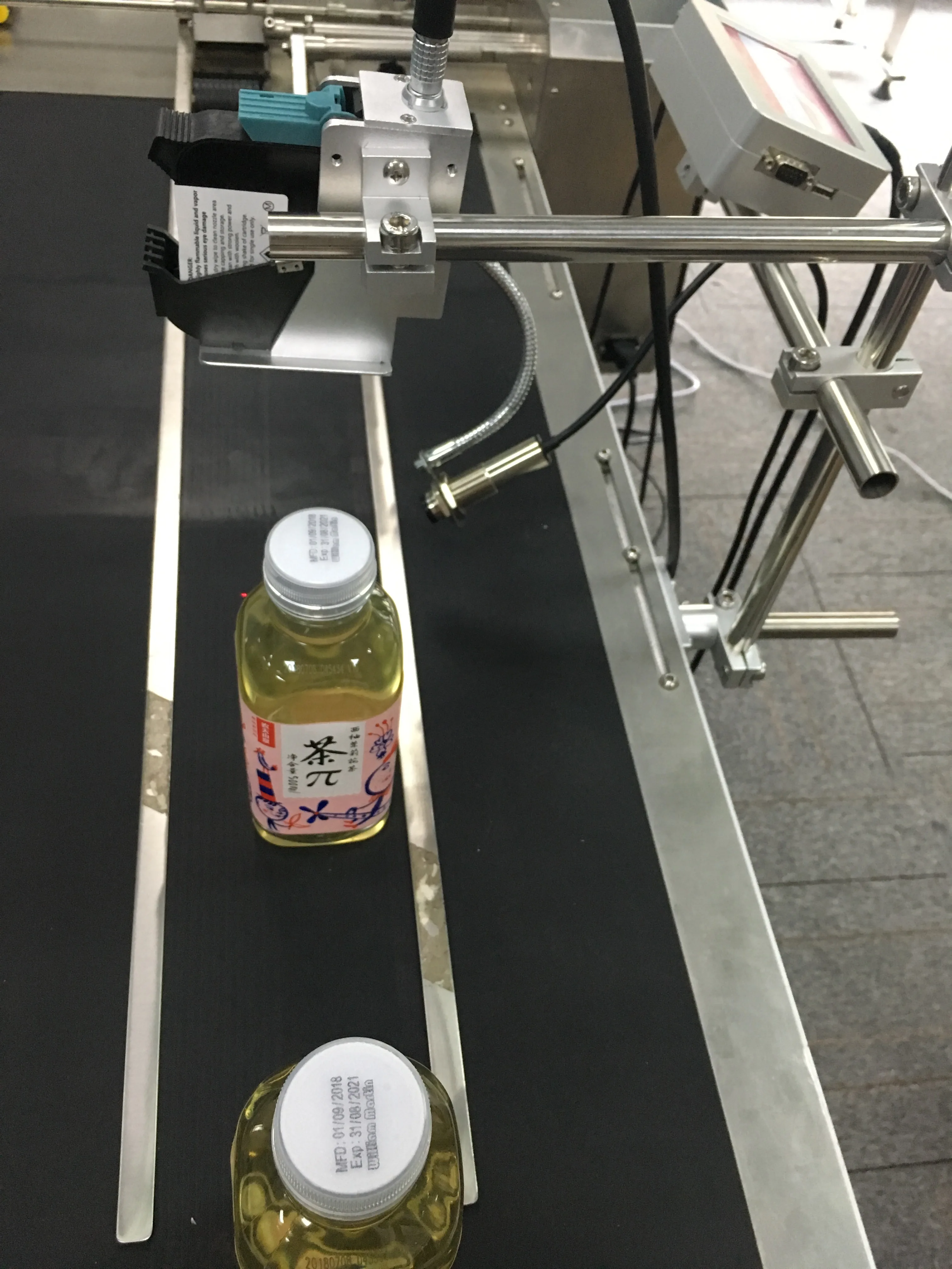 20252024 رائجة البيع آلة ترميز التاريخ المضمن دعامة حامل للطابعة النافثة للحبر Mannjet Mx1