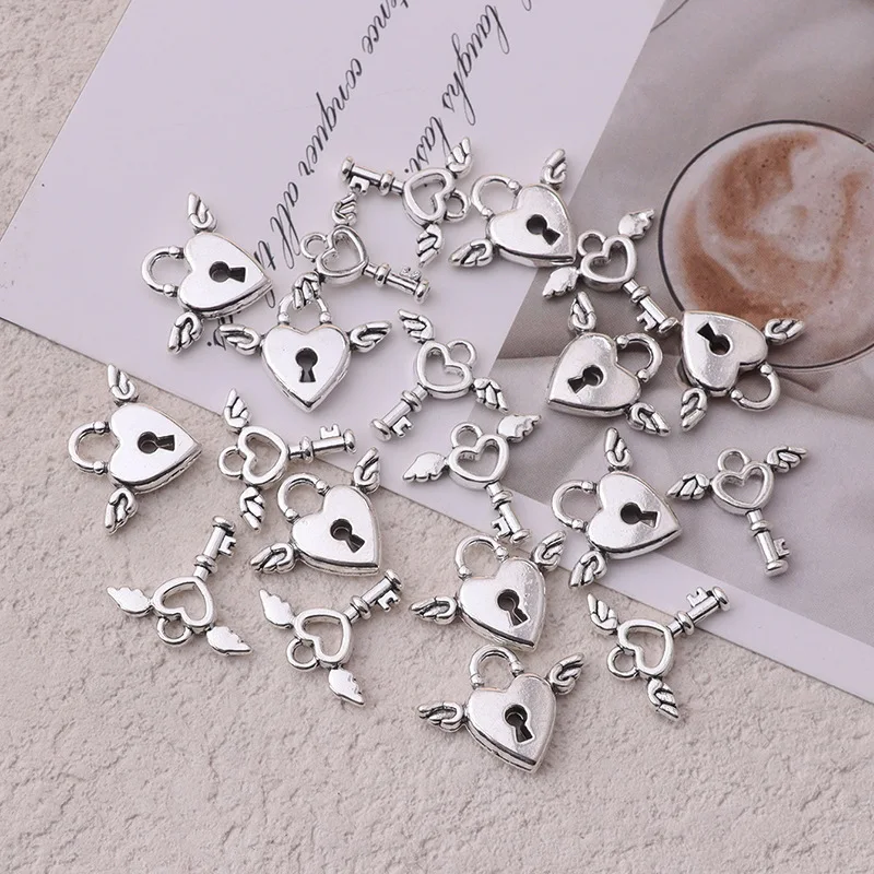 

100Pcs Tiny Wing Key Style Silver Color Pendants Jewelry Making Handmade DIY for Necklace , Keychain Gifts Charms (Pendant Only)