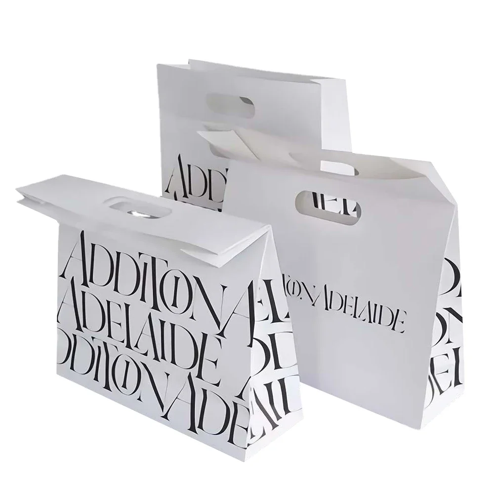 Custom-printed paper gift bags circular handle stylishly present gifts Logo-printed luxury boutique paper bags