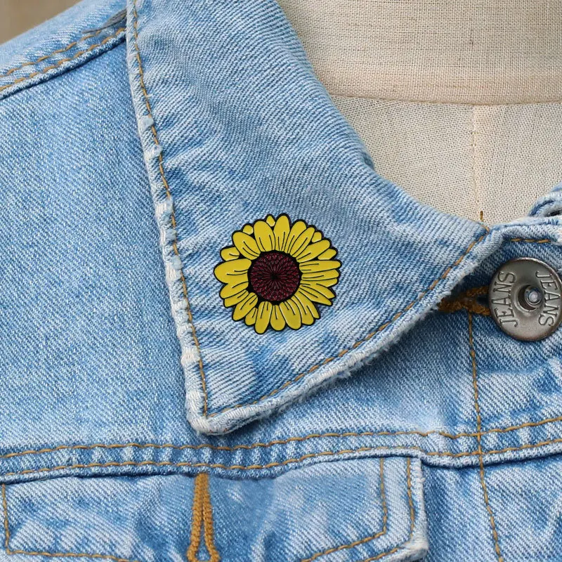 Sunflower enamel pins can see the bright side and find hope even in the darkest times