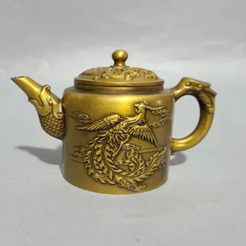 

Antique antique brass dragon and phoenix teapot