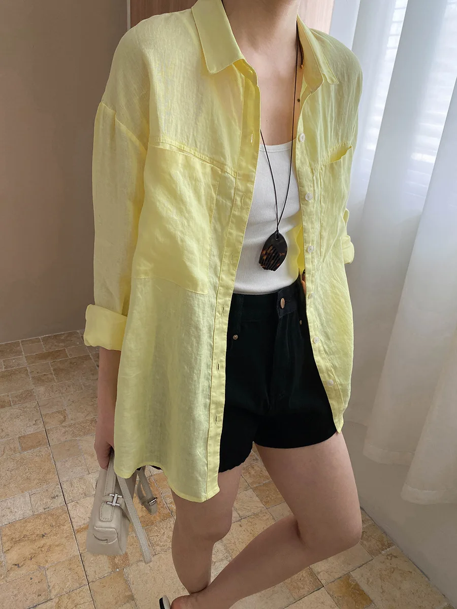 

Spring and summer women's casual solid color lapel long sleeved pocket decoration loose shirt