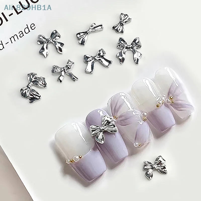 Metal Bowknot 3D Encantos das unhas, liga prateada Acessórios, Manicure Rhinestone, Jóias Diamante, Nail Art Salon Decorações, 10pcs