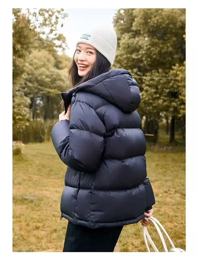 Cappotto Piumino Giacca da pane Inverno Nuovo modello 2025 Stoccaggio di calore Piumino d'anatra bianco spesso Giacca da pane corta con cappuccio da donna