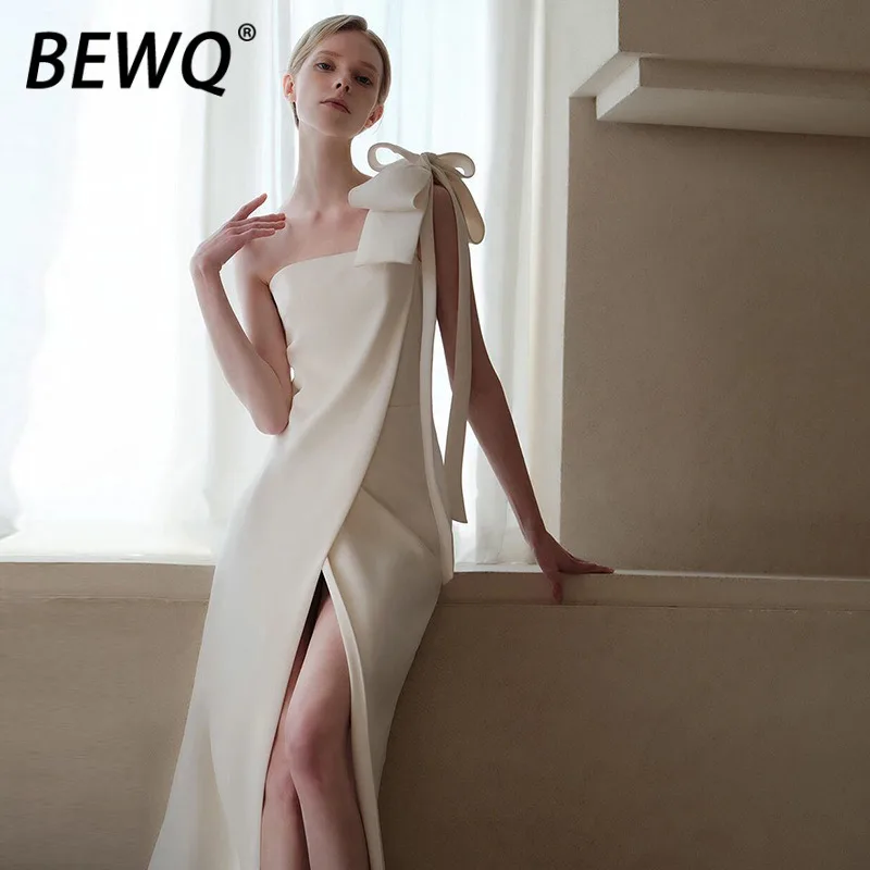 BEWQ แฟชั่นผู้หญิงชุดเดรสหรูหราเย็บปะติดปะต่อกันดอกไม้ 3 มิติสลิมสูงแยกซาตินสีทึบชุดราตรี 2025 ฤดูใบไม้ร่วงใหม่