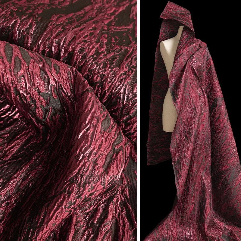 

Wine red undulating veins gilded jacquard heavy three-dimensional Chinese-style coat fabric designed by a fashion designer