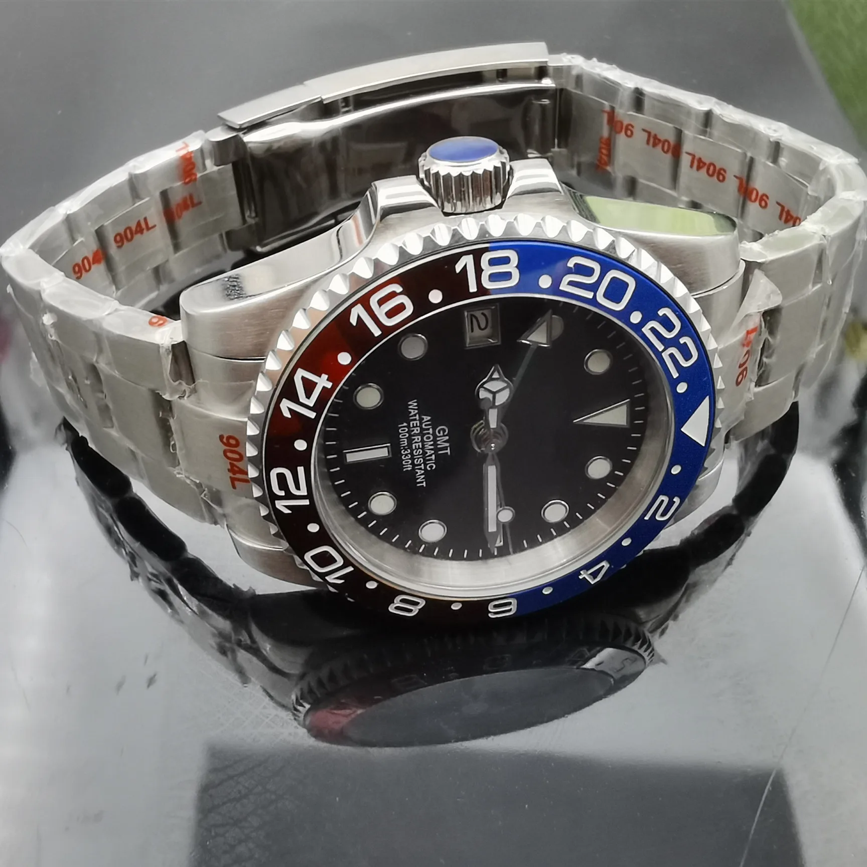 New Gmt Dual Time Zone Displays A 100-Meter Waterproof Left Crown Stainless Steel Watch Japan Nh34 Greenwich Automatic Movement