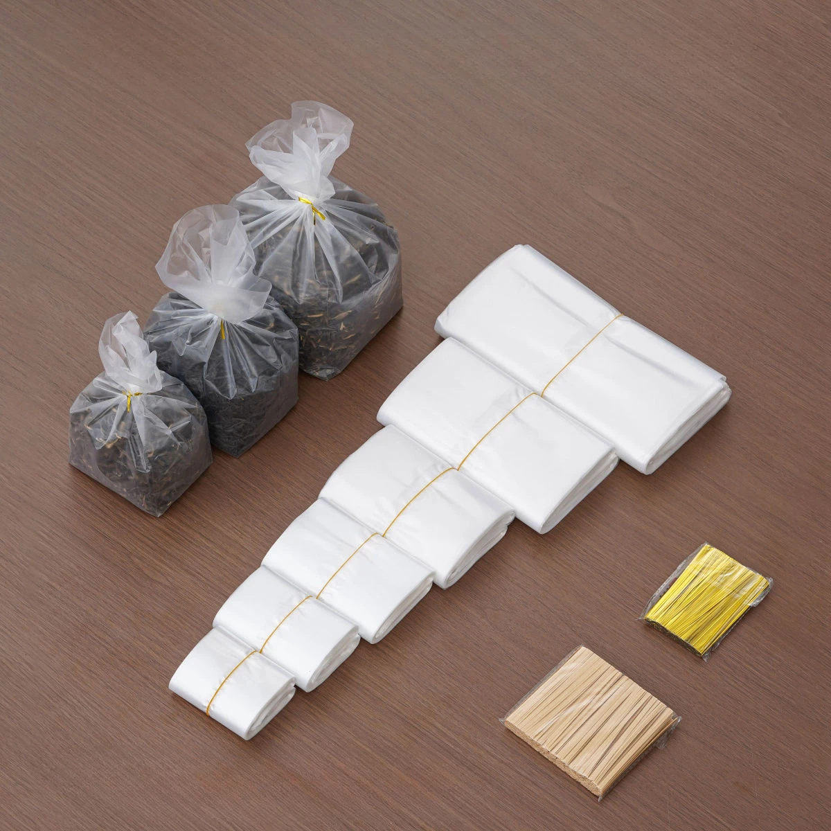 124 pièces en relief Transparent Membrane intérieure sac pot boîte-cadeau résistant à l'humidité sacs intérieurs thé noix Grains fil d'or poches scellées