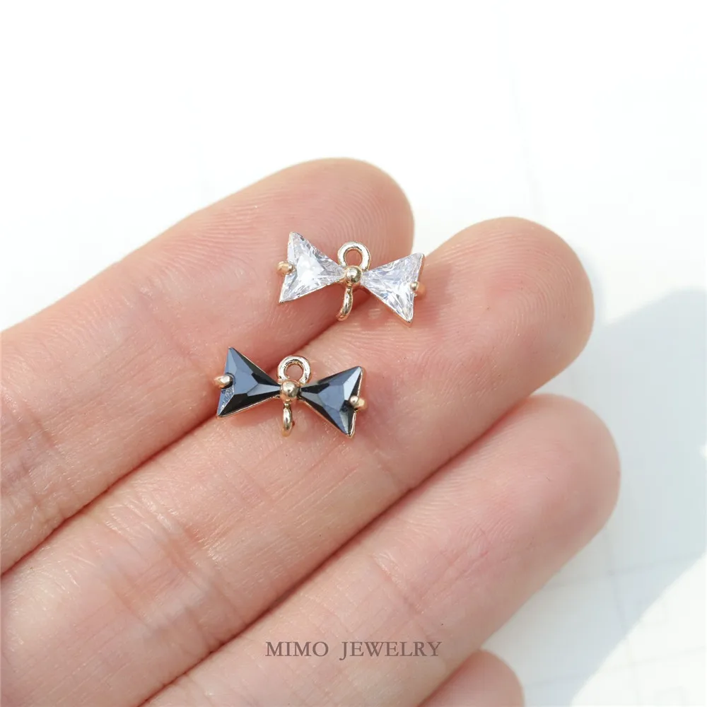 

1PCS 12x6.5mm Copper Plated with Real Gold and Slightly Inlaid Zircon Black and White Bow Tie Double Pendant DIY Accessory
