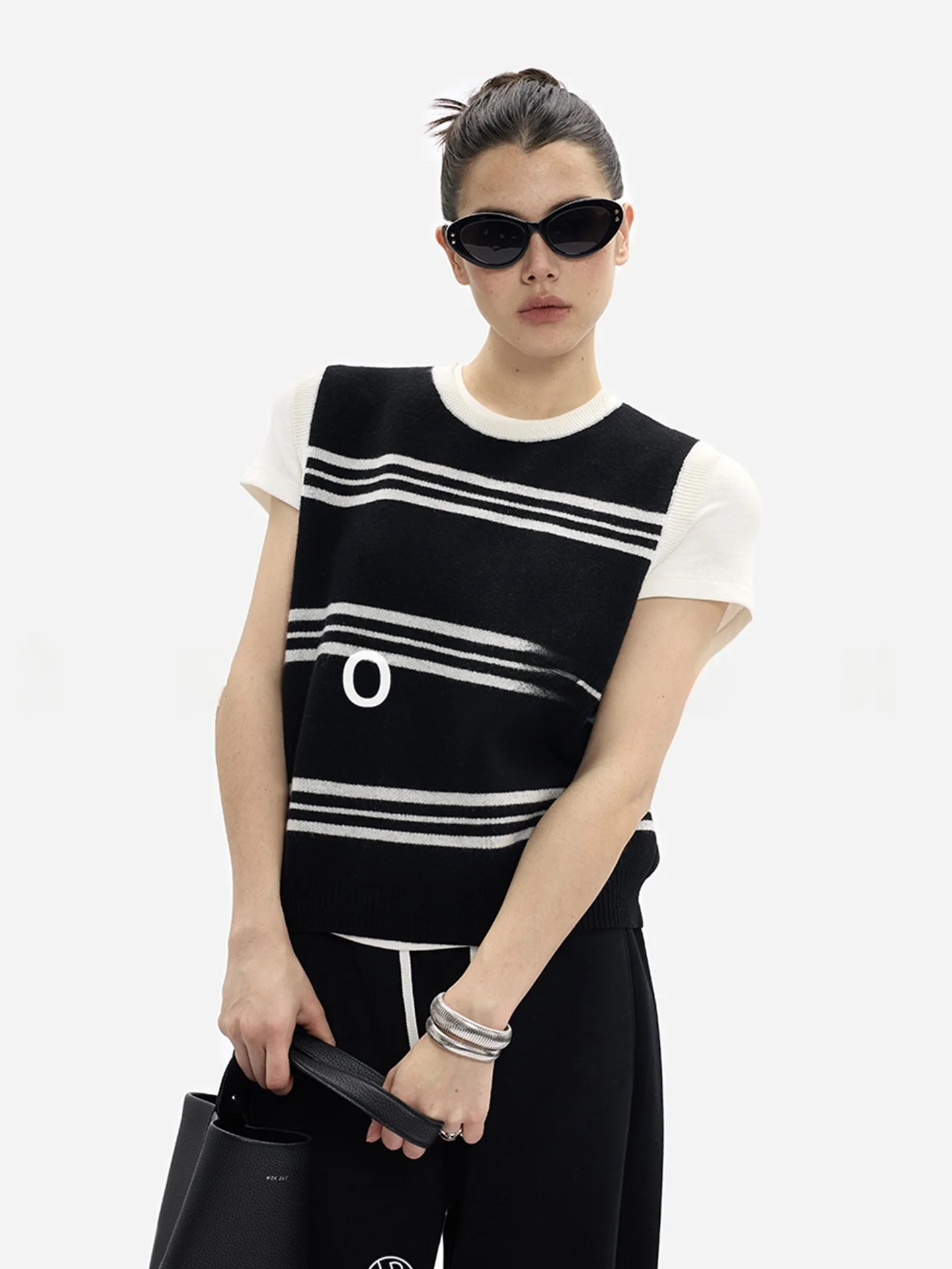 Okrągła dzianinowa kamizelka 2025 Jesień Kolor Colion Luksusowa Prosta Damska Bluzka Bez Rękawów Wyszczuplająca Lekka Kamizelka