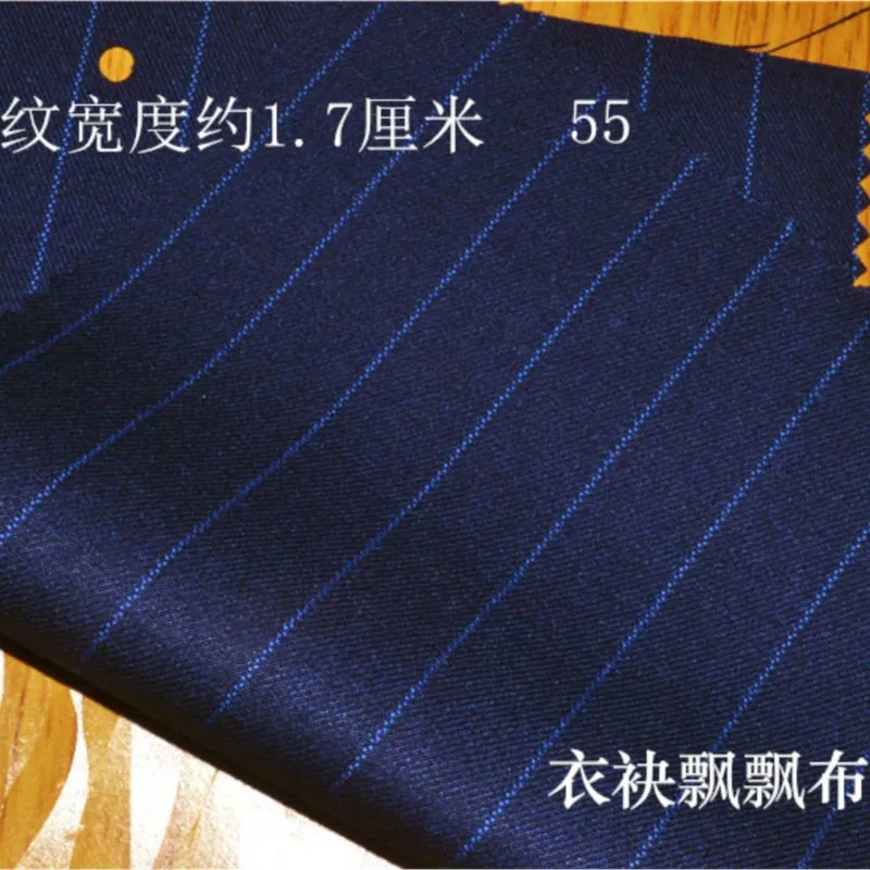 Pakstof kreukvrij blauw geel zwart wit en rood breed gestreepte broek rok professionele kleding