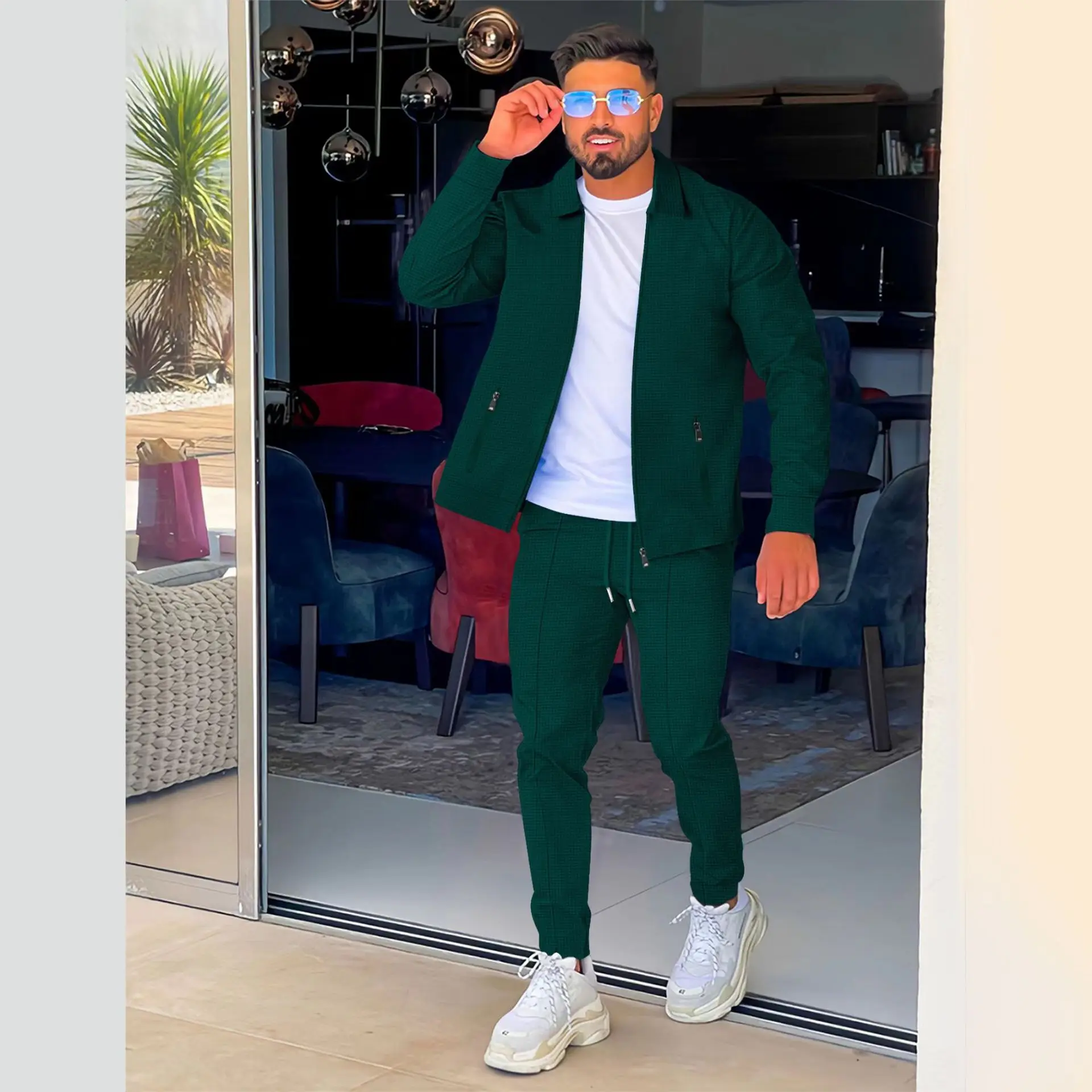 

Men's waffle knit two-piece casual zipper jacket and sports pants set is loose but not cumbersome. Men's solid color sports outf