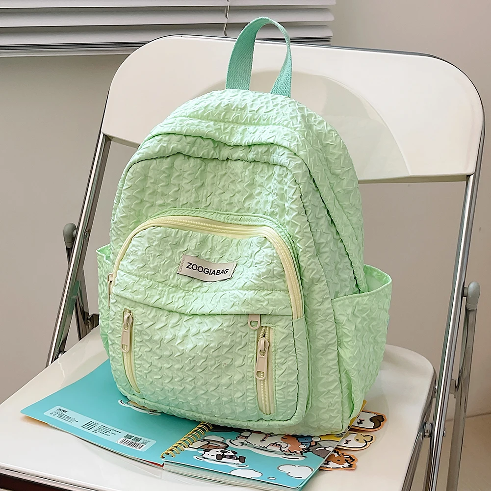 Mochila escolar bonita para niños, mochila de nailon de Color sólido para estudiantes, pliegues multibolsillos, ligera, resistente a los arañazos, ajustable, leisu diario