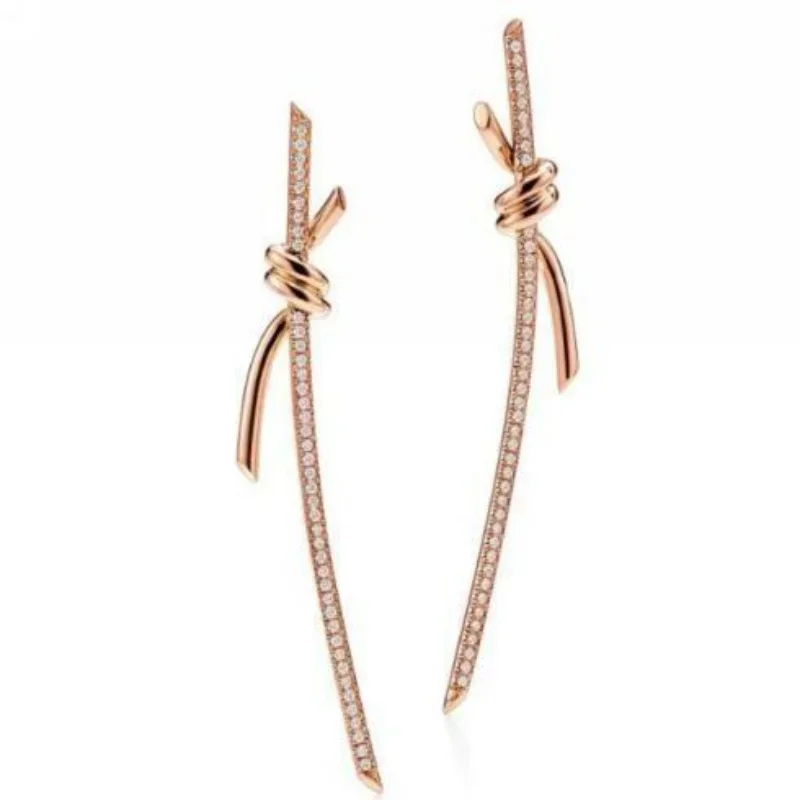 

Rose Gold Linear Drop Earrings with Pavé Diamond-Encrusted Knot Accent