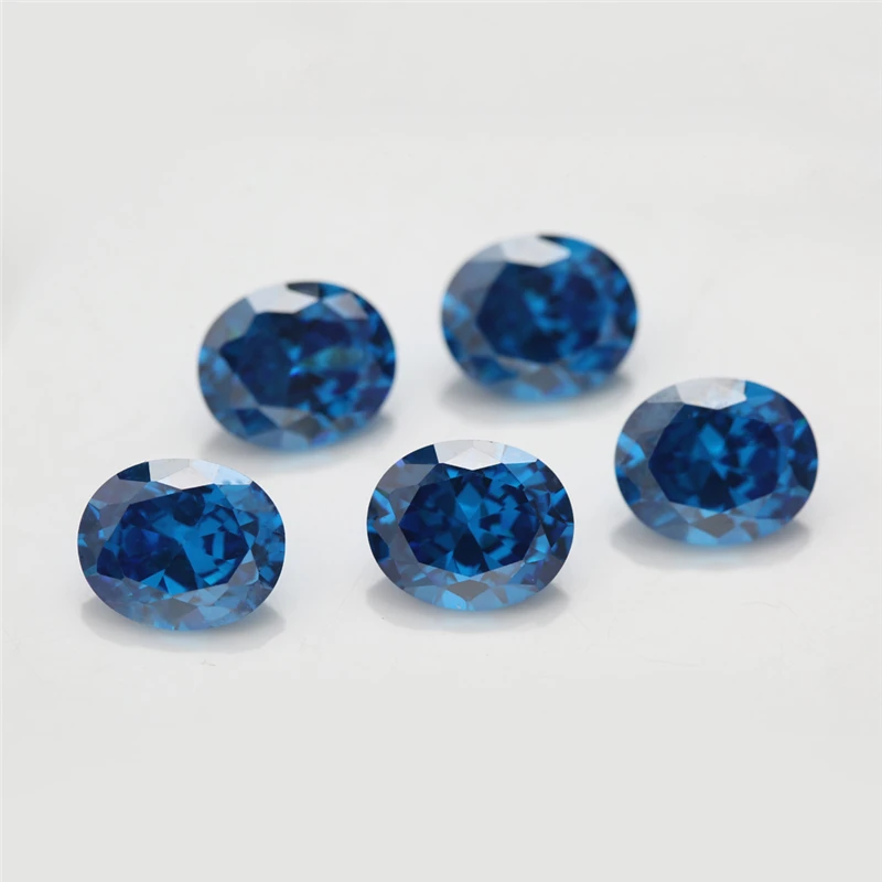 Gemas sintéticas de circonia cúbica con forma ovalada, 3x5 ~ 10x12mm, 5A, piedras CZ sueltas, verde, mar, azul, café, Rodolita, Color tanzanita