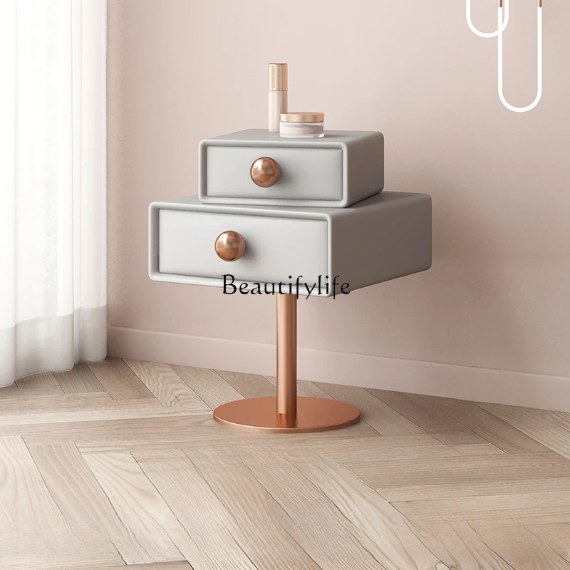 

Rotating solid wood bedside table Light luxury high-end sense Simple modern design Cream wind bedside table
