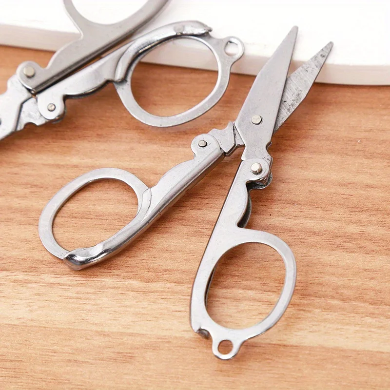 4pcsMini foldable scissors，Essential for home and travel，With keychain，Random packaging bag color