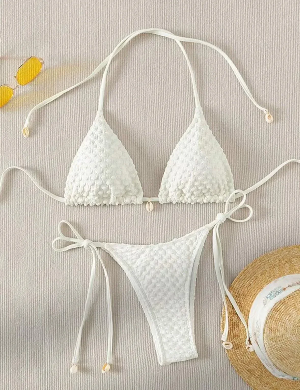 Bikini blanco Sexy 2025 para mujer, traje de baño Micro de diseñador de Metal con realce de encaje Halter, traje de baño brasileño con Tanga lateral y lazo