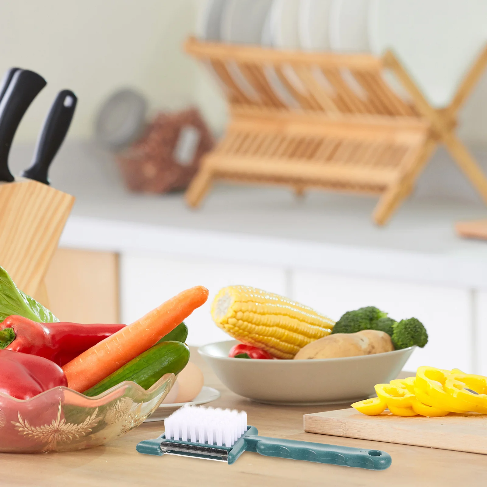

Five-in-One Multifunctional Peeler Fruit Brush Bottle Opener Garlic Tool Potato Peel Kitchen Gadget Easy Storage
