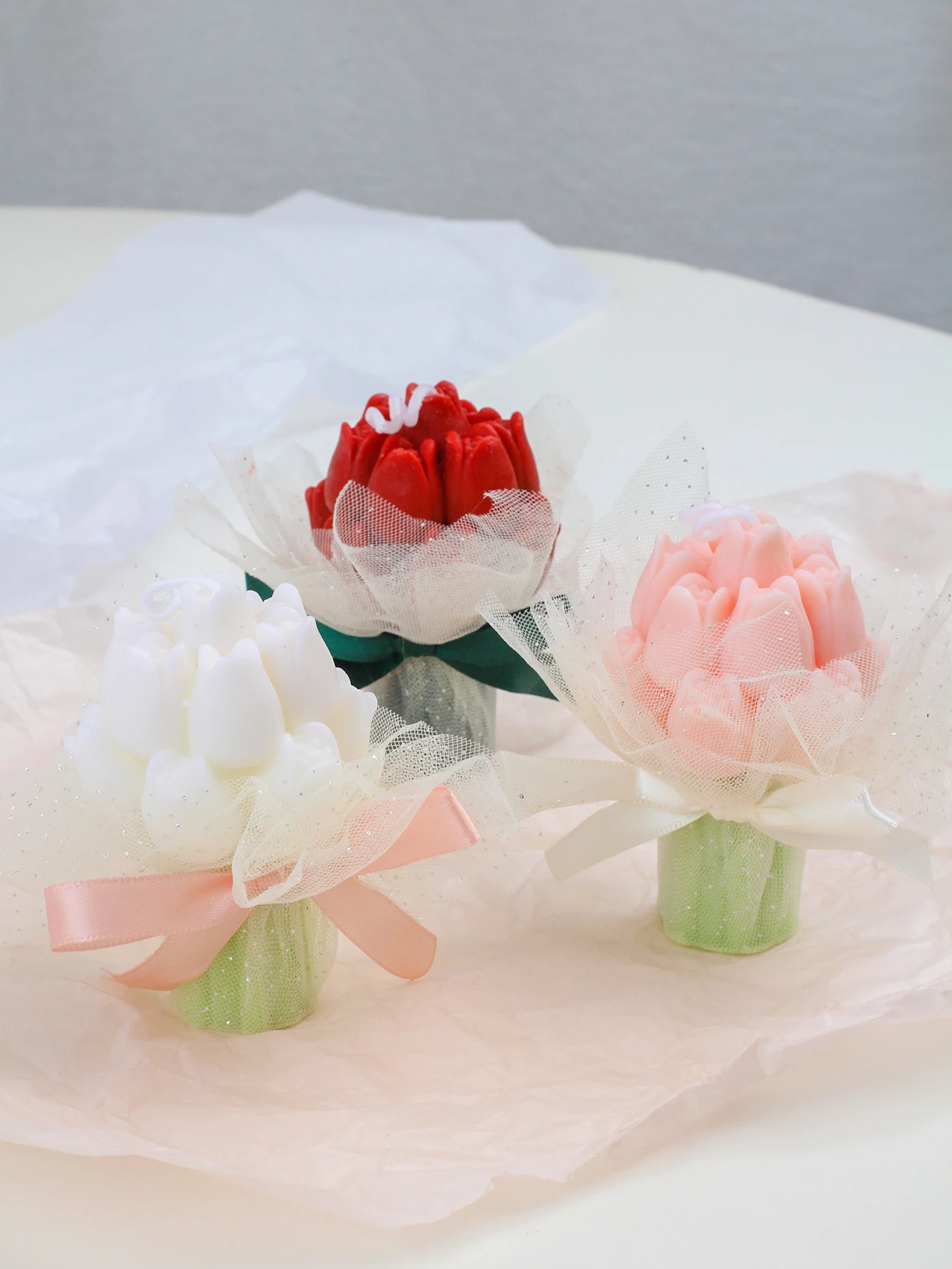 A bouquet of wine-red tulips with candles, an aroma-scented candle, wedding party decoration, Mother's Day gift, souvenir, birth