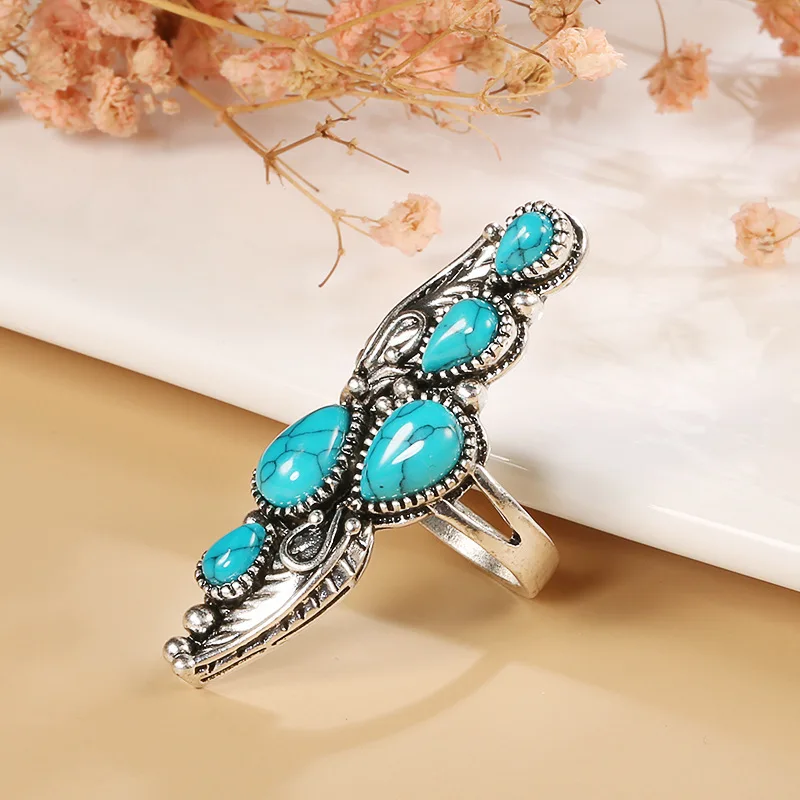 diy-accessories-cross-border-european-and-american-retro-personalized-inlaid-turquoise-ring-creative-exaggerated-old-feather-li