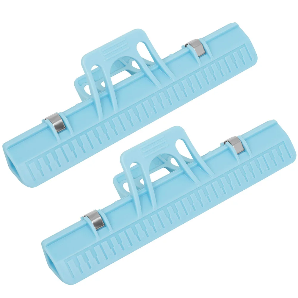 قطعتان من مشابك ورق الموسيقى المدمجة وخفيفة الوزن ومتينة ومناسبة لمختلف الأدوات ونتيجة جيتار البيانو