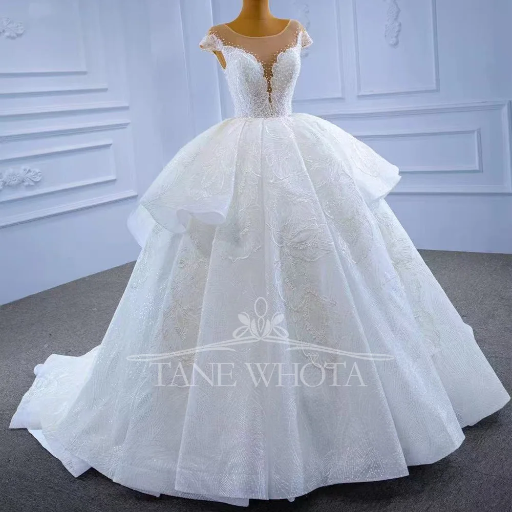 高級レースウェディングドレス 2025 Oネック キャップスリーブ レースアップバック ビーズ装飾 ボールガウン カスタマイズ可能 ノイバ ベスティド・デ・カサメント