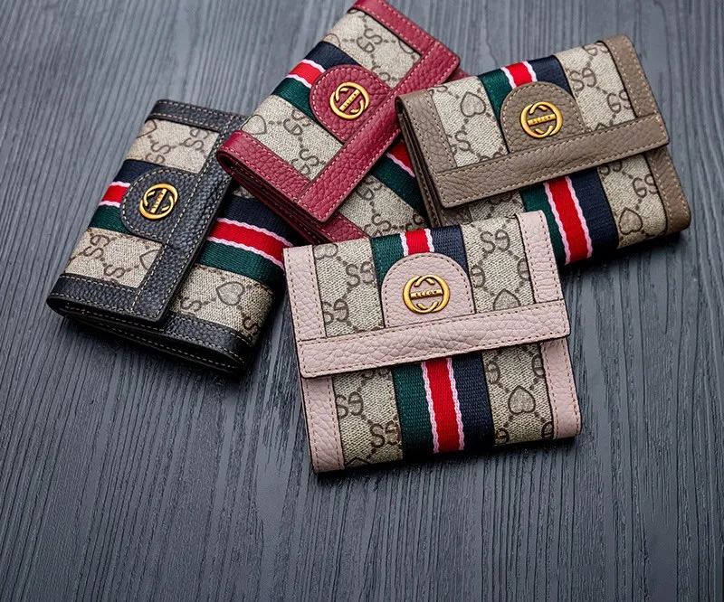 women‘s New folding wallet light luxury design Genuine Leather wallet zero wallet buckle three fold simple design