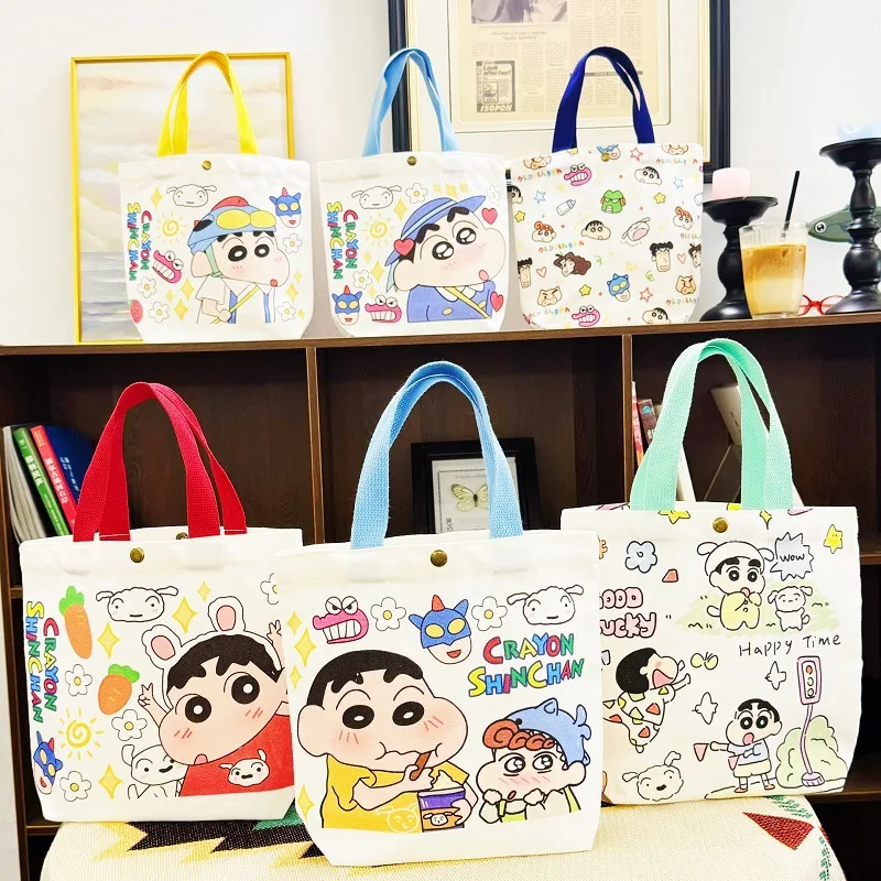 

Crayon Shin-chan Canvas Bag Student Lunch Box Handheld Cotton Bucket Bag Shopping Water Cup Storage Package Cute Festival Gifts
