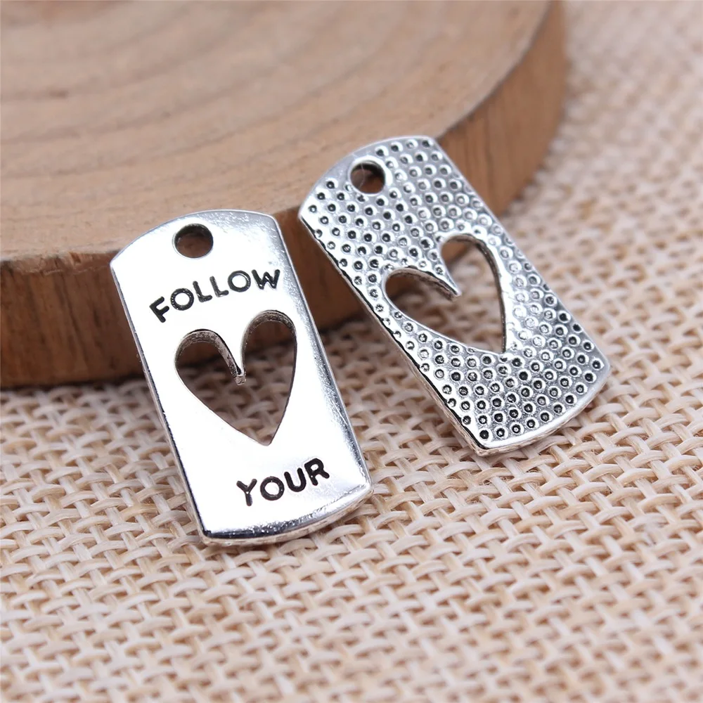 40 peças de pingentes de prata antiga com a inscrição Follow Your Heart, 10x20mm (0,39x0,79 polegadas), para fabricação de joias DIY.