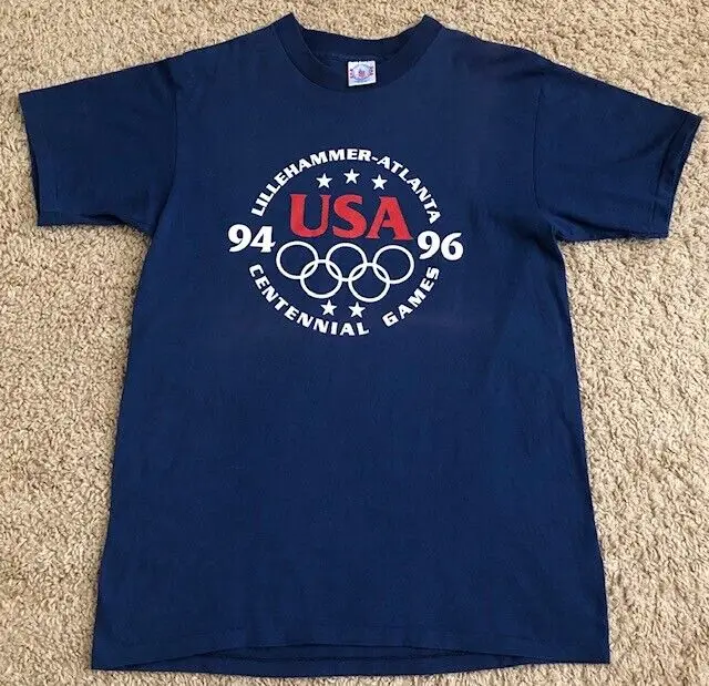 

Синяя графическая рубашка Lillehammer-Атланта Centennial Games USA 1994 1996