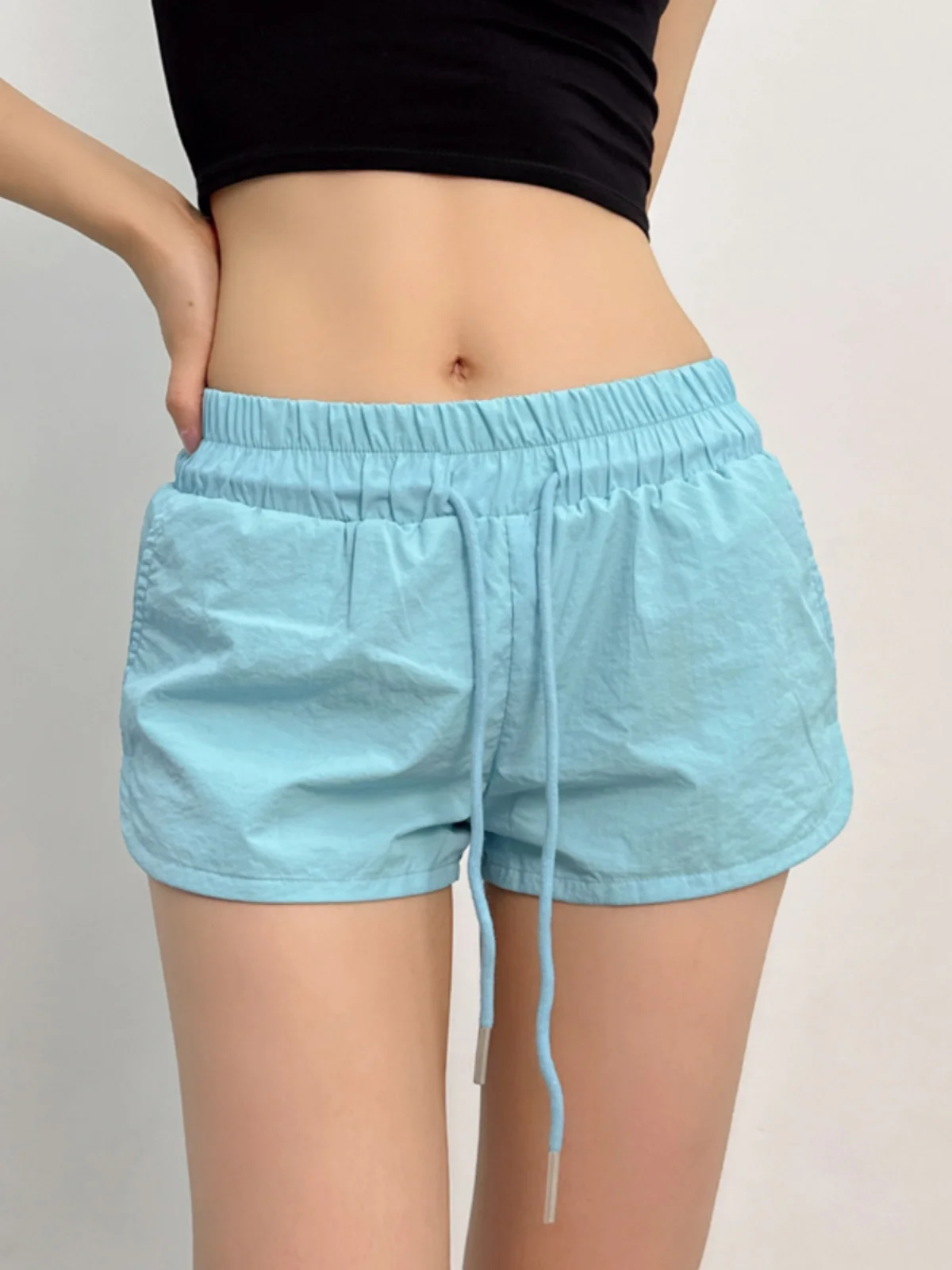 

American Style Summer Solid Color Casual Drawstring Elastic Waist Sports Shorts Spicy Girl Loose Wide Legs Cargo Shorts E7AA