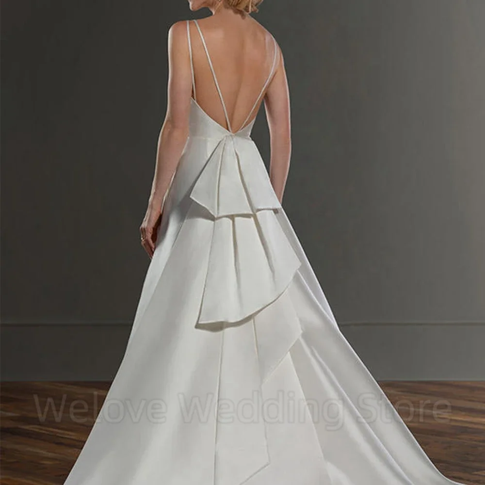 فستان زفاف بسيط بحمالات رفيعة مزدوجة مثير مفتوح الظهر بدون أكمام على شكل حرف a طول الأرض فساتين زفاف من الساتان للزواج