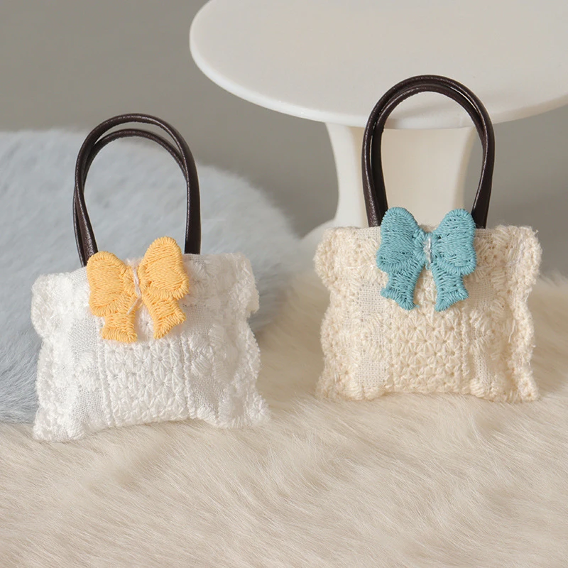 

1Pcs new DIY Scene Accessories Craft Sewing Goods 1:12 Mini Dollhouse Handbag Model Realistic Bowknot Crossbody Bag Decoration