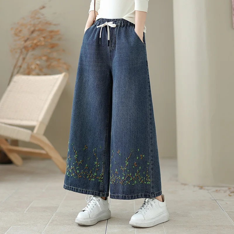 Hoge kwaliteit dames denim broek herfst en winter 2026 etnische stijl bloem geborduurde denim wijde pijpen broek gezellige broek