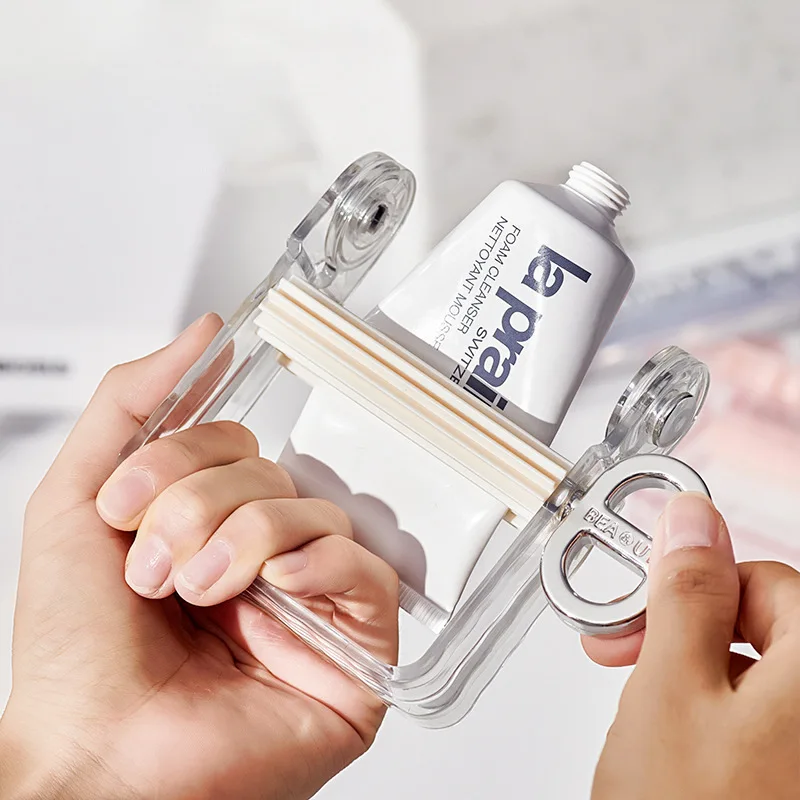 

Инструмент для соковыжималки зубной пасты Ручной пластиковый тюбик-дозатор для легкого выжимания ванной комнаты Необходим для зубной пасты и кремов на каждый день